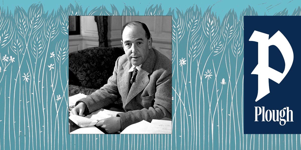 Black and white photo of a man in a suit sitting at a desk with papers, next to Plough logo on blue background.