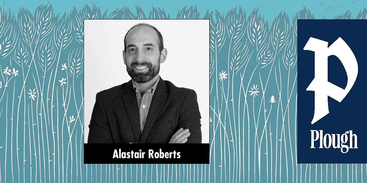 Black-and-white photo of Alastair Roberts with arms crossed against a floral blue background.