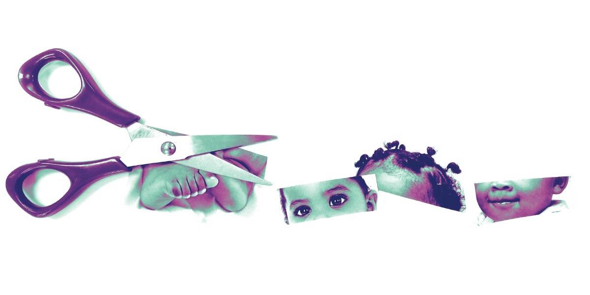 Large scissors cutting a photo of a baby's face and feet into horizontal strips on a white background.