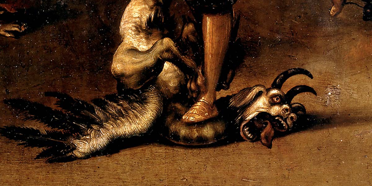 A creature with a goat-like head, horns, and a long tongue is being stepped on by a person wearing sandals.