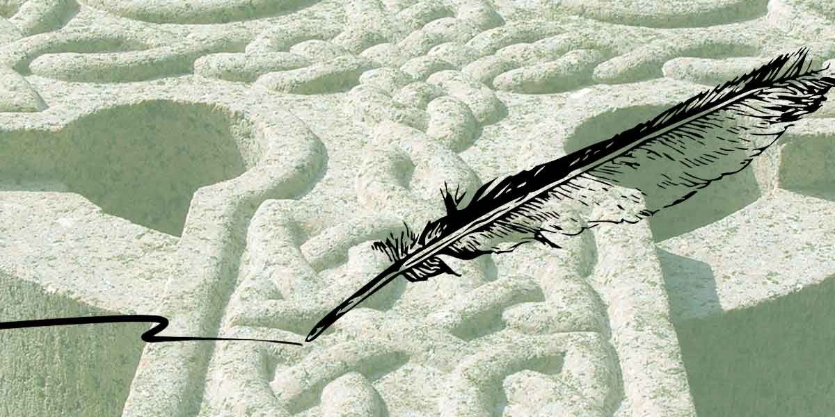 Black feather quill drawing a line over a textured stone background with carved patterns.