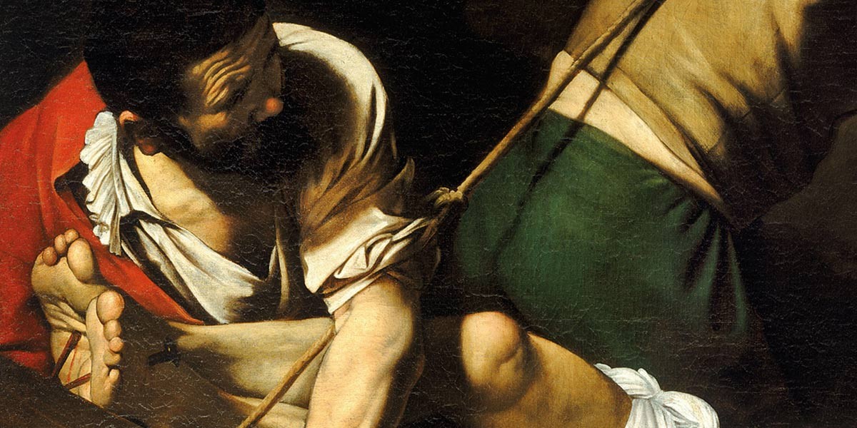 Detail of two men tied with ropes, one in a red cloak looking at the other in green trousers.