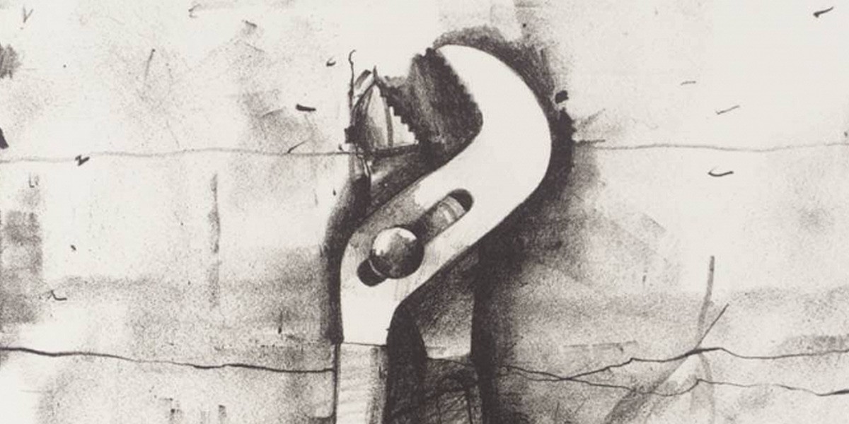 Black and white graffiti-style drawing of a large adjustable wrench on a textured wall.