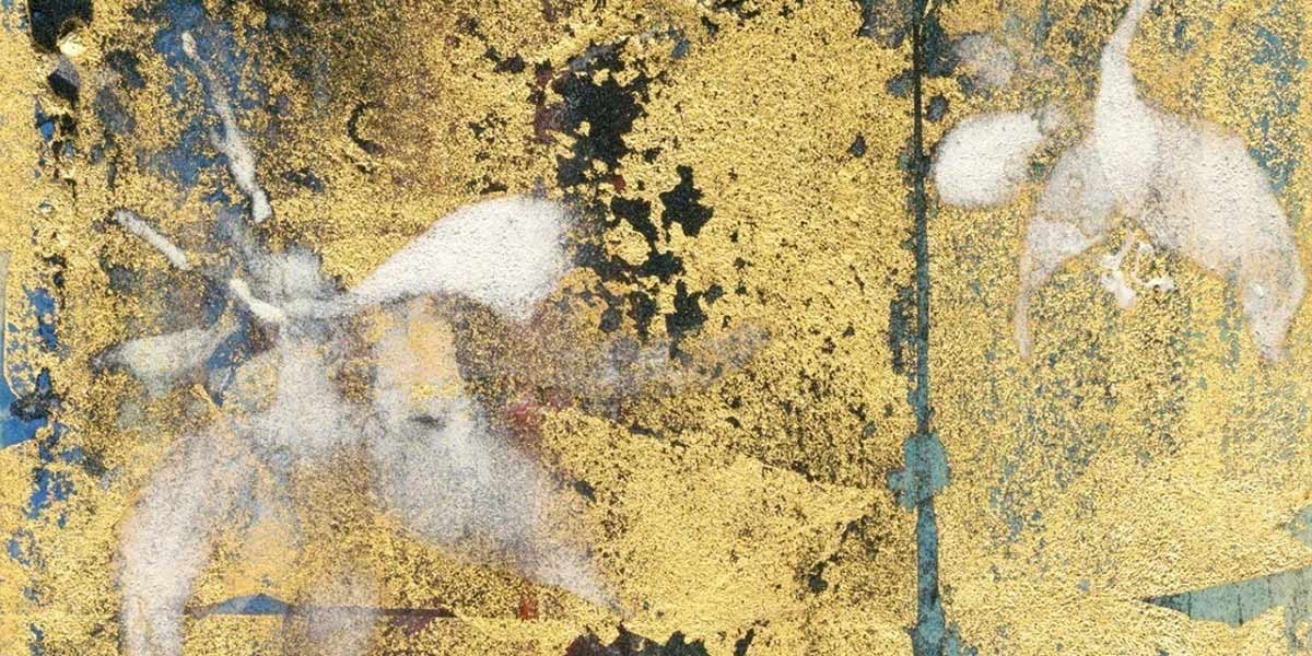 Weathered gold leaf panel with faded, abstract floral and leaf patterns on a blue background.