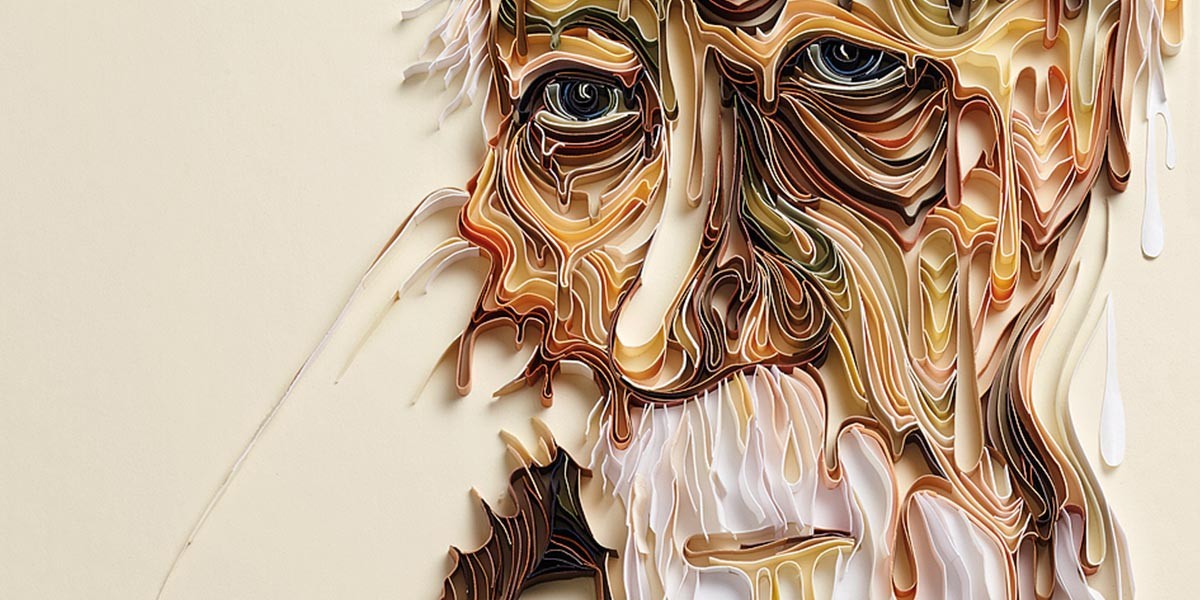 Abstract layered paper art of a bearded man's face with flowing lines and earth tones.