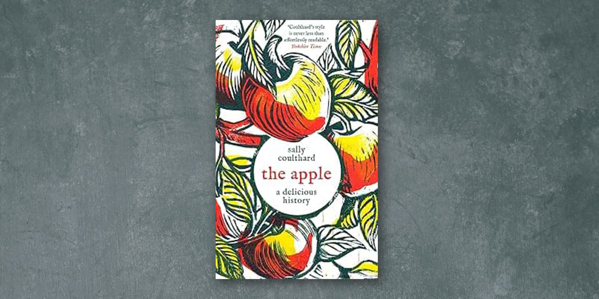 Book cover of 'The Apple: A Delicious History' by Sally Coulthard with illustrated apples and leaves.