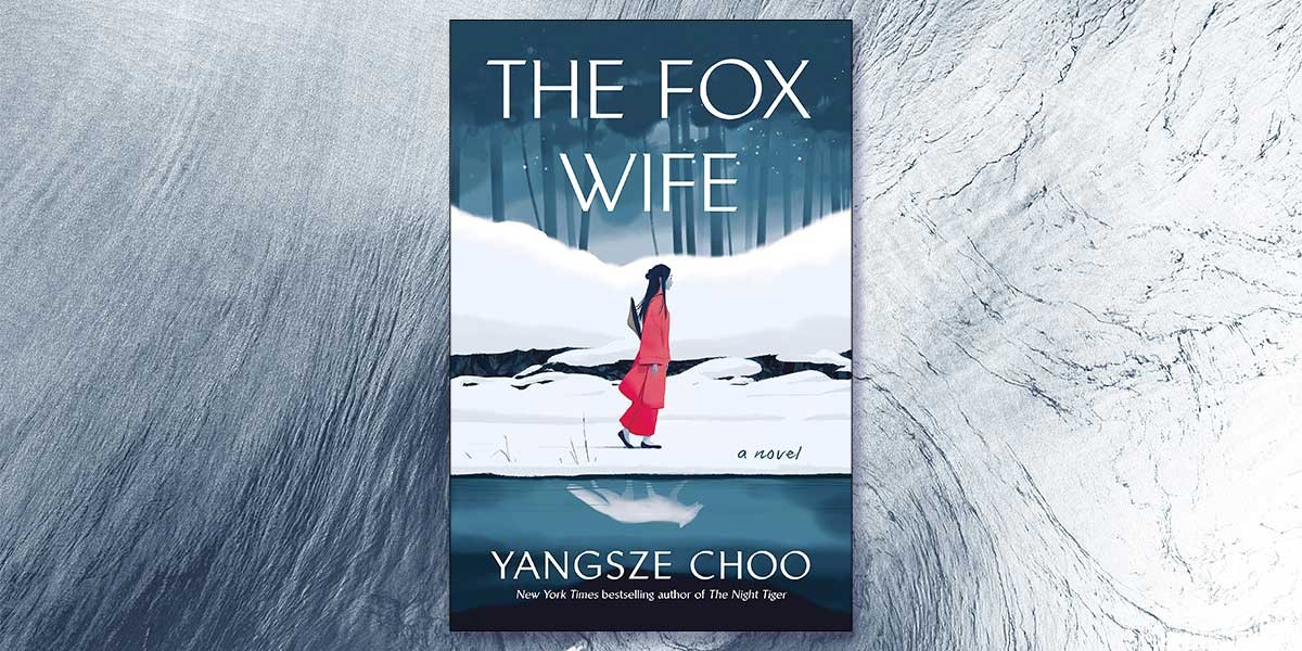 Book cover of 'The Fox Wife' by Yangsze Choo shows a person in red walking through a snowy landscape.