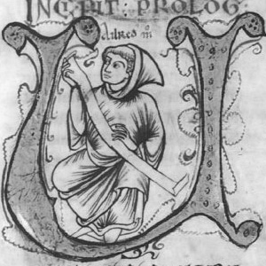Medieval illustration of a seated figure inside a large decorative letter U holding a scroll.