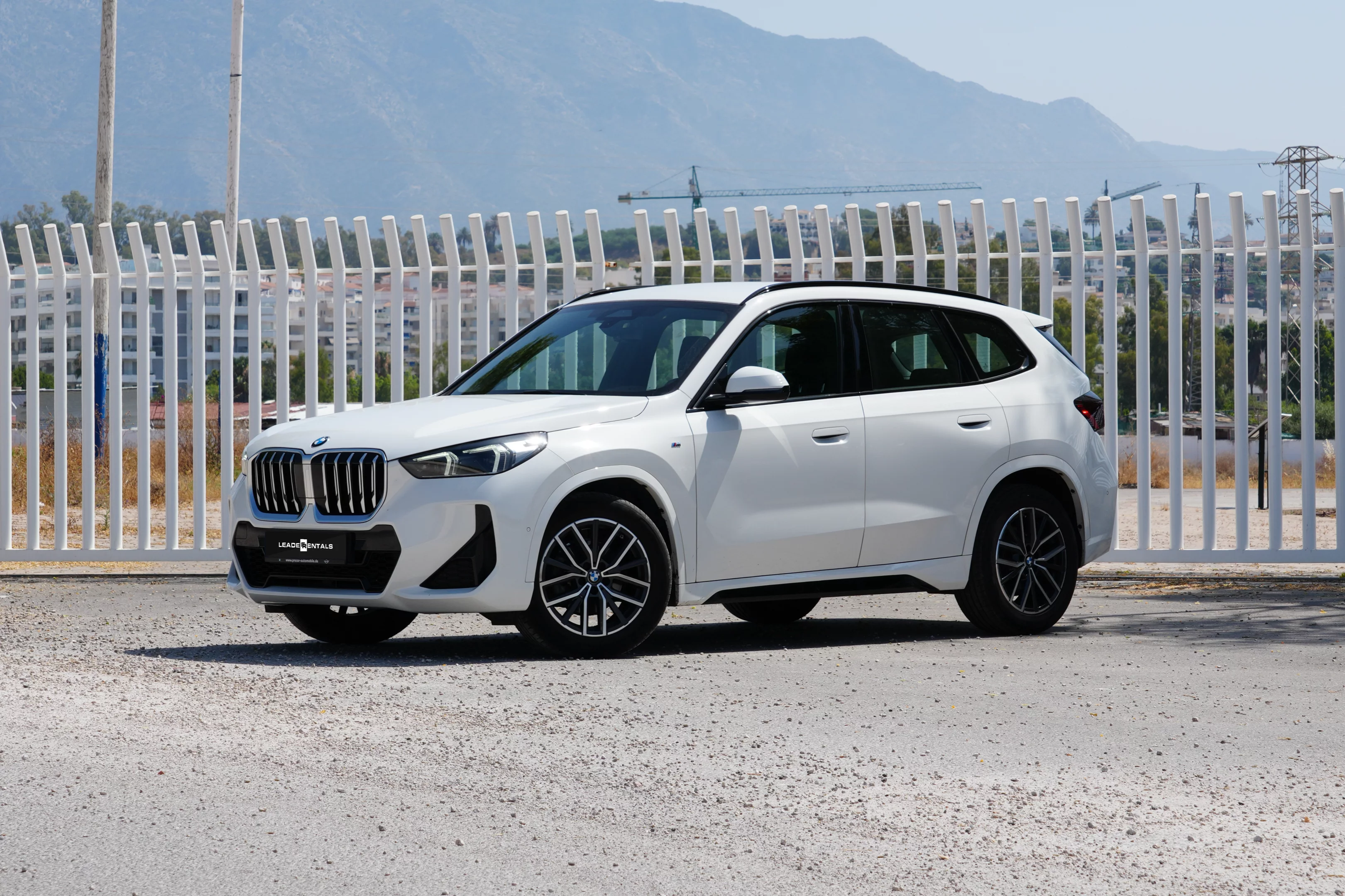 Drive the BMW X1 sDrive16d with Leader Rentals — a compact luxury SUV offering elegant design, premium comfort, and excellent fuel efficiency. With 116 hp and agile handling, it’s perfect for urban drives or scenic European routes. Enjoy BMW’s signature refinement, spacious interior, and smart tech features, all in a versatile package ideal for couples, families, or business travelers seeking discreet luxury.