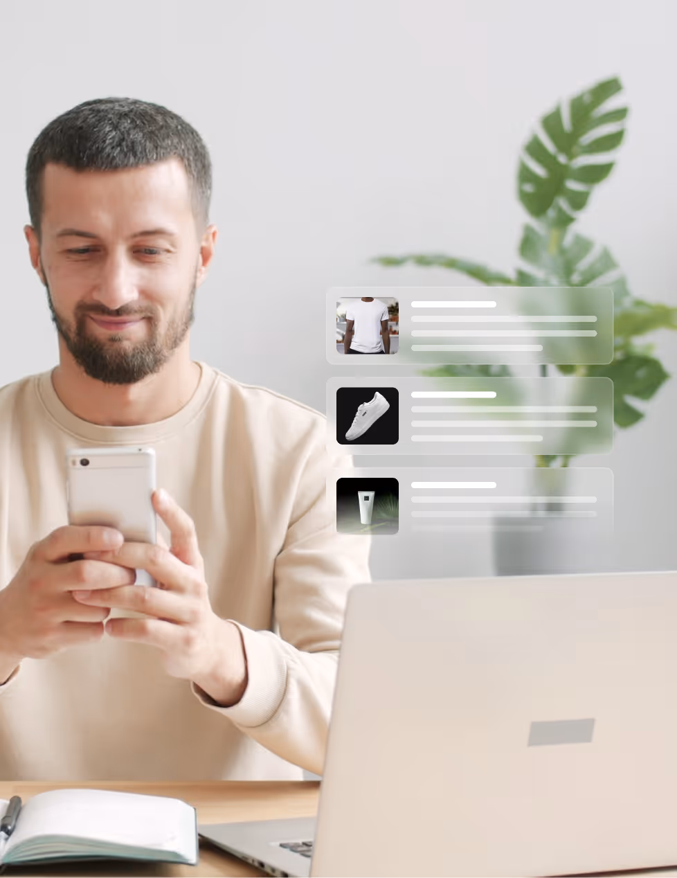Man in red plaid shirt looking at smartphone with a laptop and digital shopping icons floating to the right.
