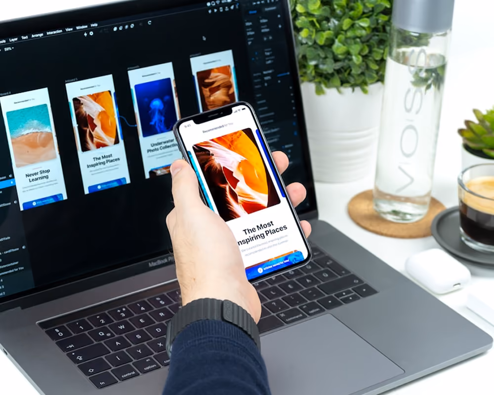 A UI/UX Design is designing and testing on mobile device