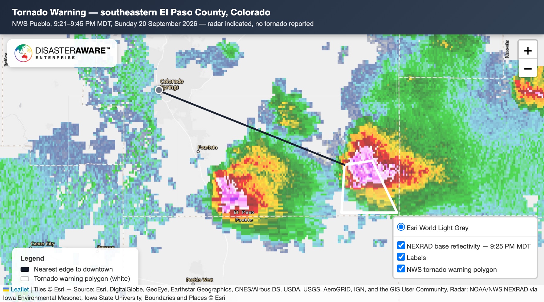 DisasterAWARE map of the September 20, 2026 tornado warning near Colorado Springs: the NWS warning polygon outlined in white over NEXRAD radar, storm core inside it, downtown 34 miles northwest. Radar NOAA/NWS via Iowa Environmental Mesonet; basemap Esri.