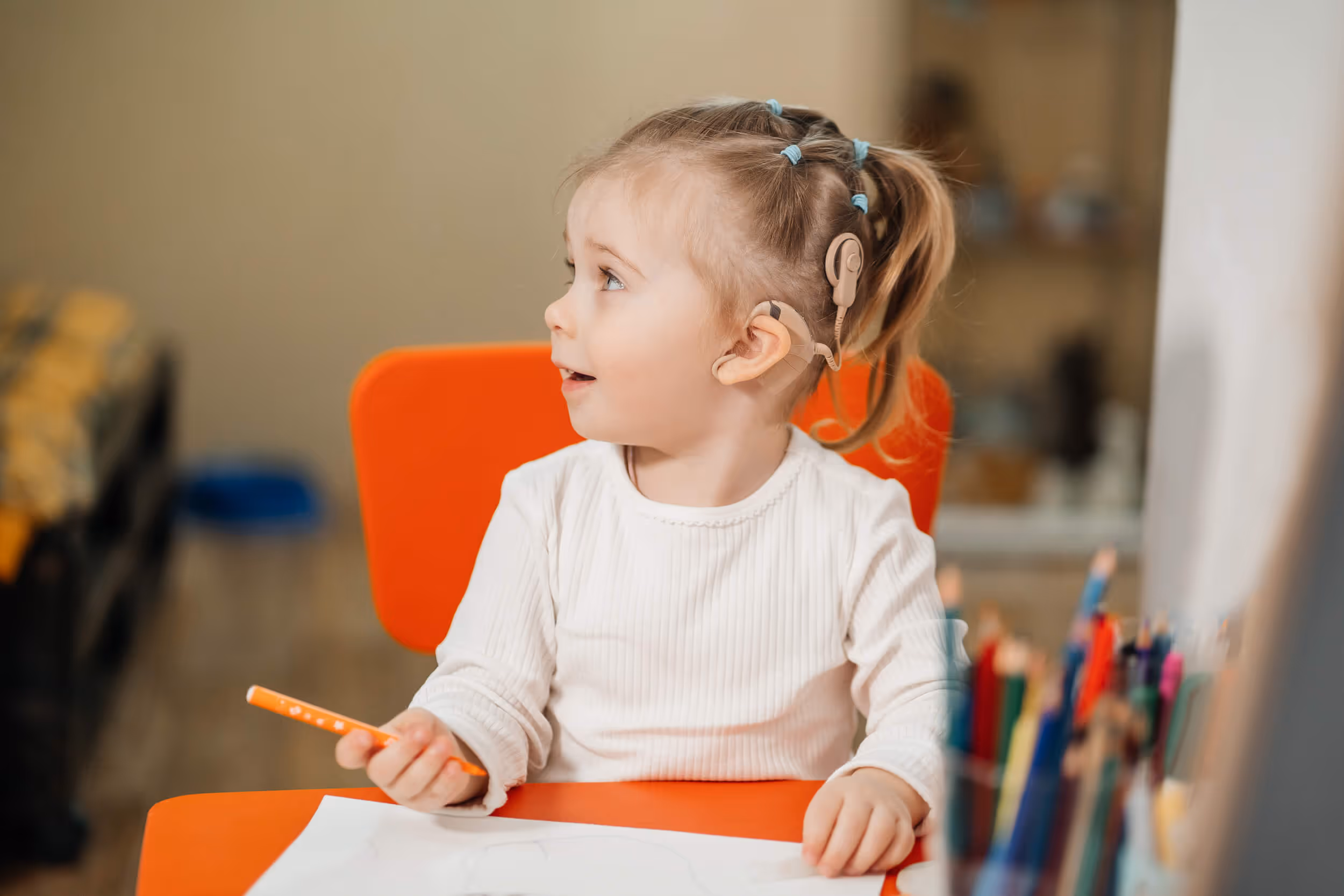 Girl with hearing aid