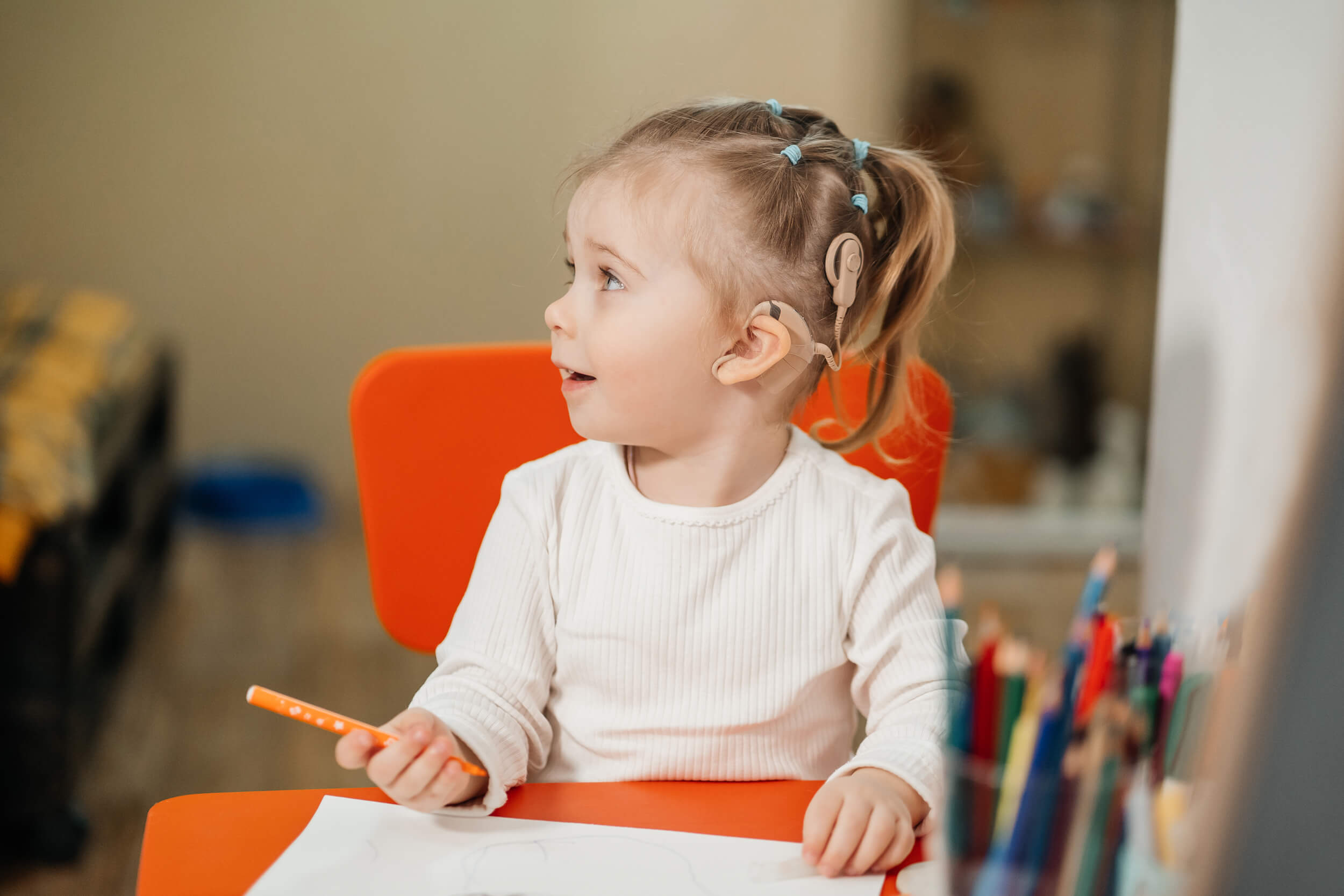 Girl with hearing aid