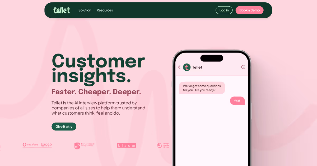 The homepage of Tellet, an AI interview platform. The bright pink  hero section shows a smartphone mockup with a conversation with the AI agent.