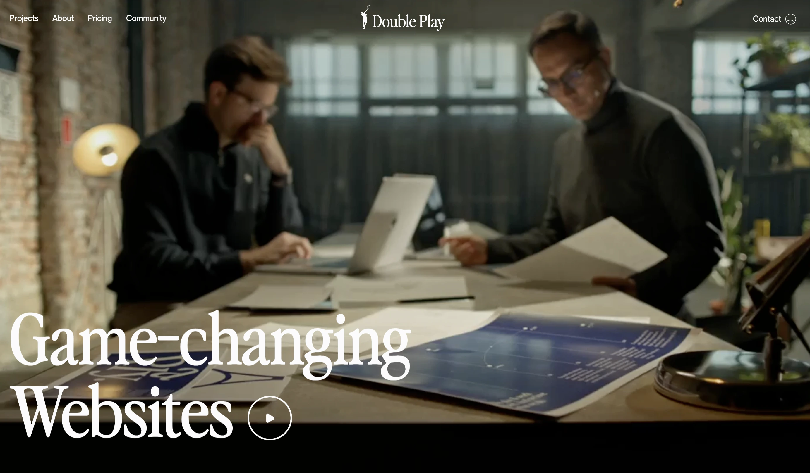 DoublePlay website showing two designers collaborating at a desk with the headline 'Game-changing Websites,' a boutique Webflow design agency in Düsseldorf
