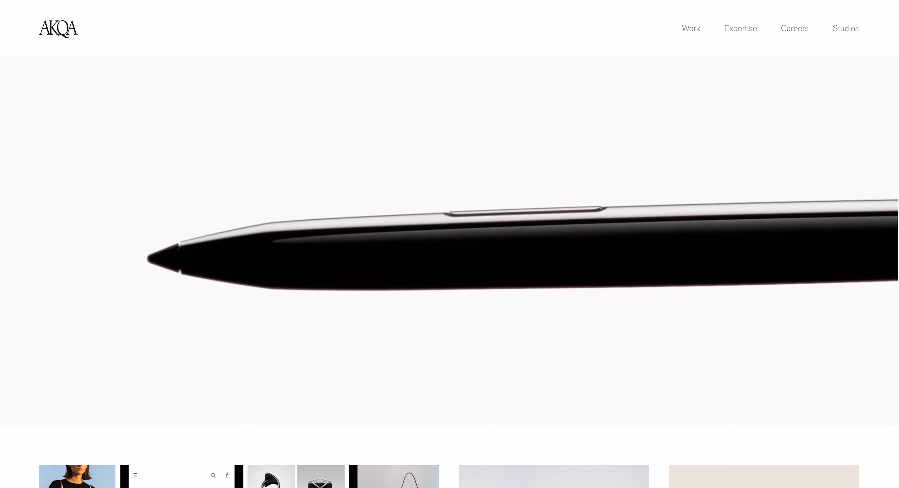 Homepage of AKQA, one of the best creative agencies for digital-first experiences, displaying a minimal product-focused hero image that reflects their design-led approach to innovation