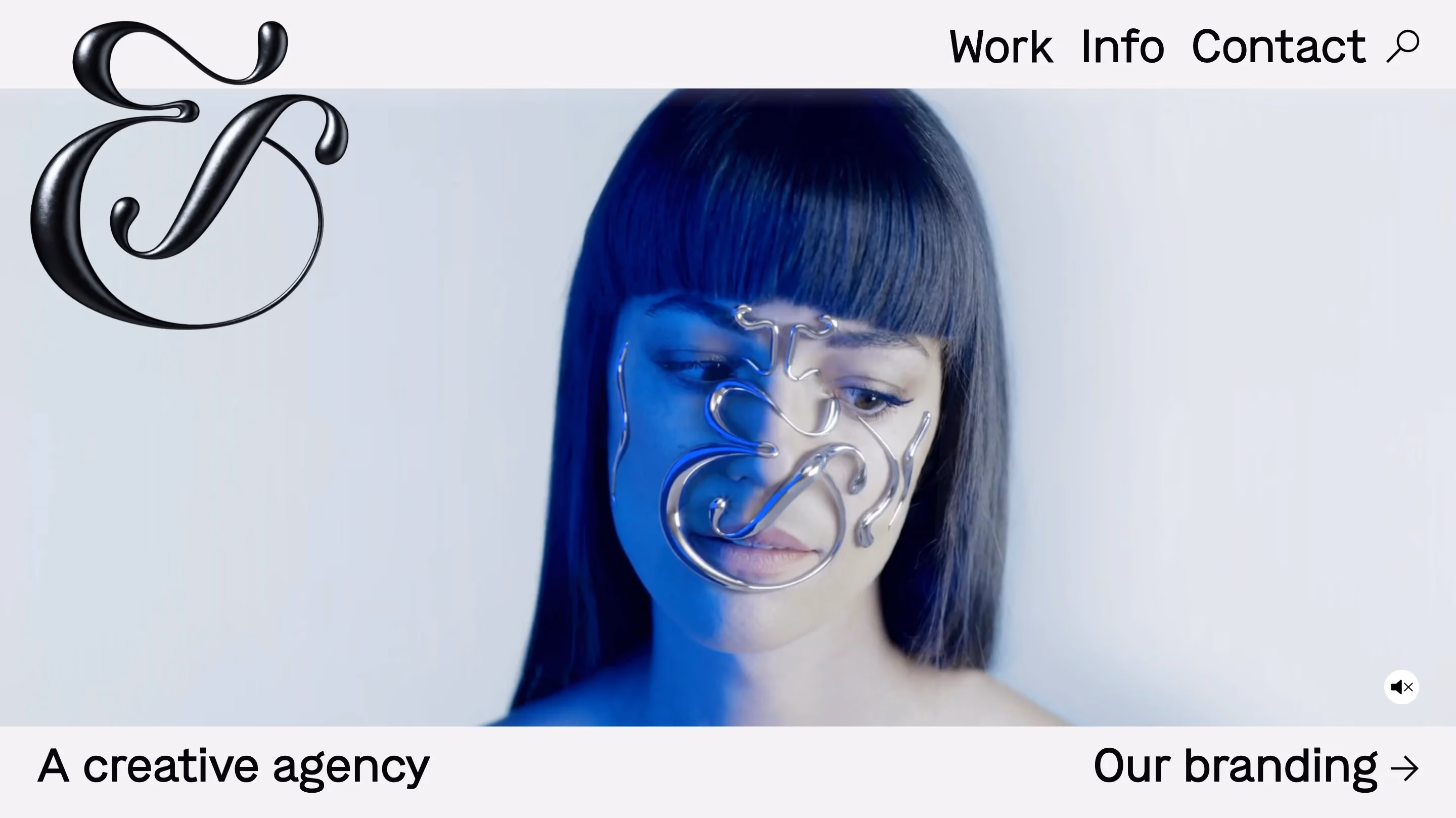 Homepage of &Walsh, one of the best creative agencies for bold visual identity, featuring a striking blue-lit portrait video with their distinctive ampersand logo