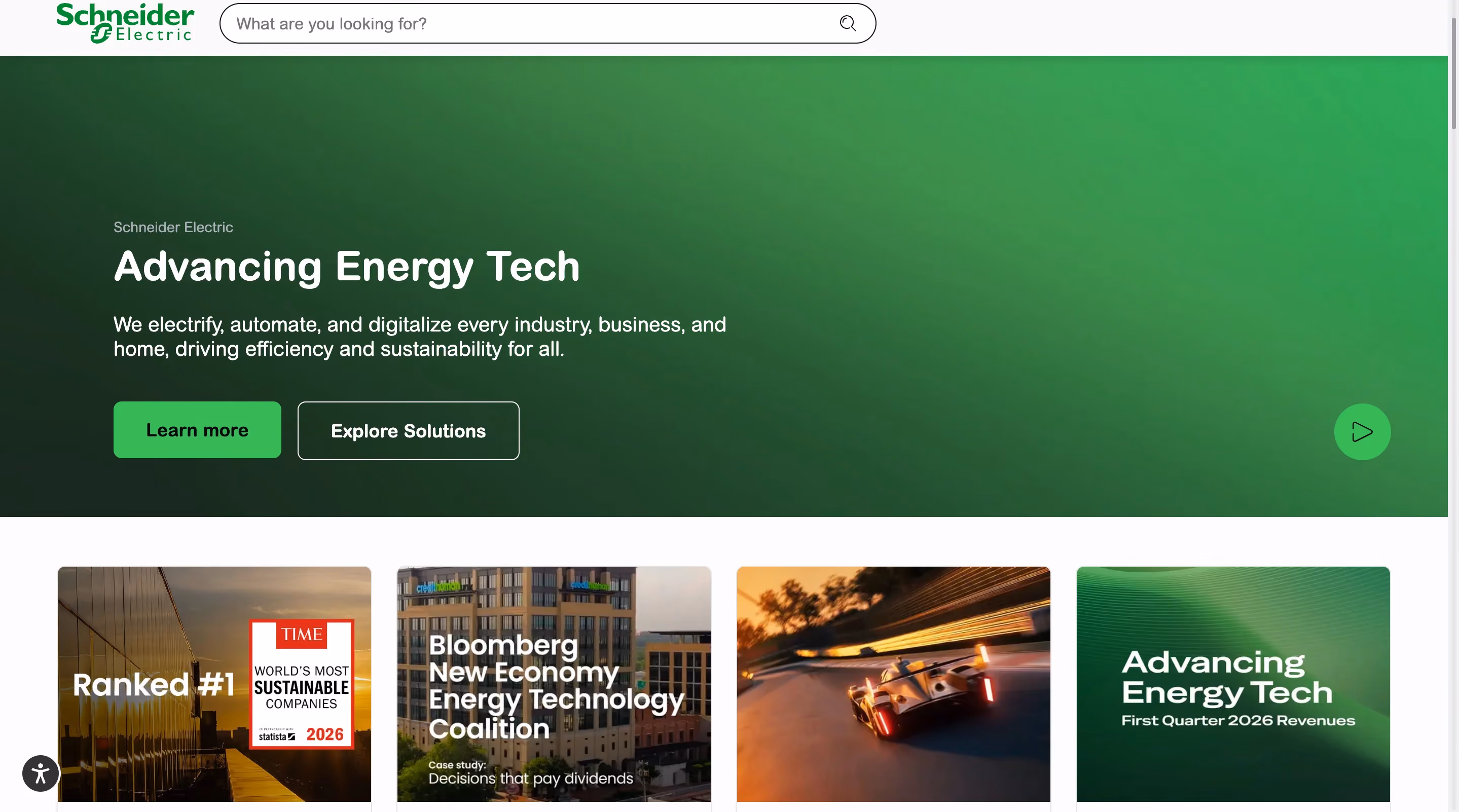Schneider Electric homepage hero on a green gradient background, headline "Advancing Energy Tech," subtext about electrifying, automating, and digitalizing industry, with Learn more and Explore Solutions buttons, and a row of news cards below including a Time sustainability ranking and a Bloomberg case study.