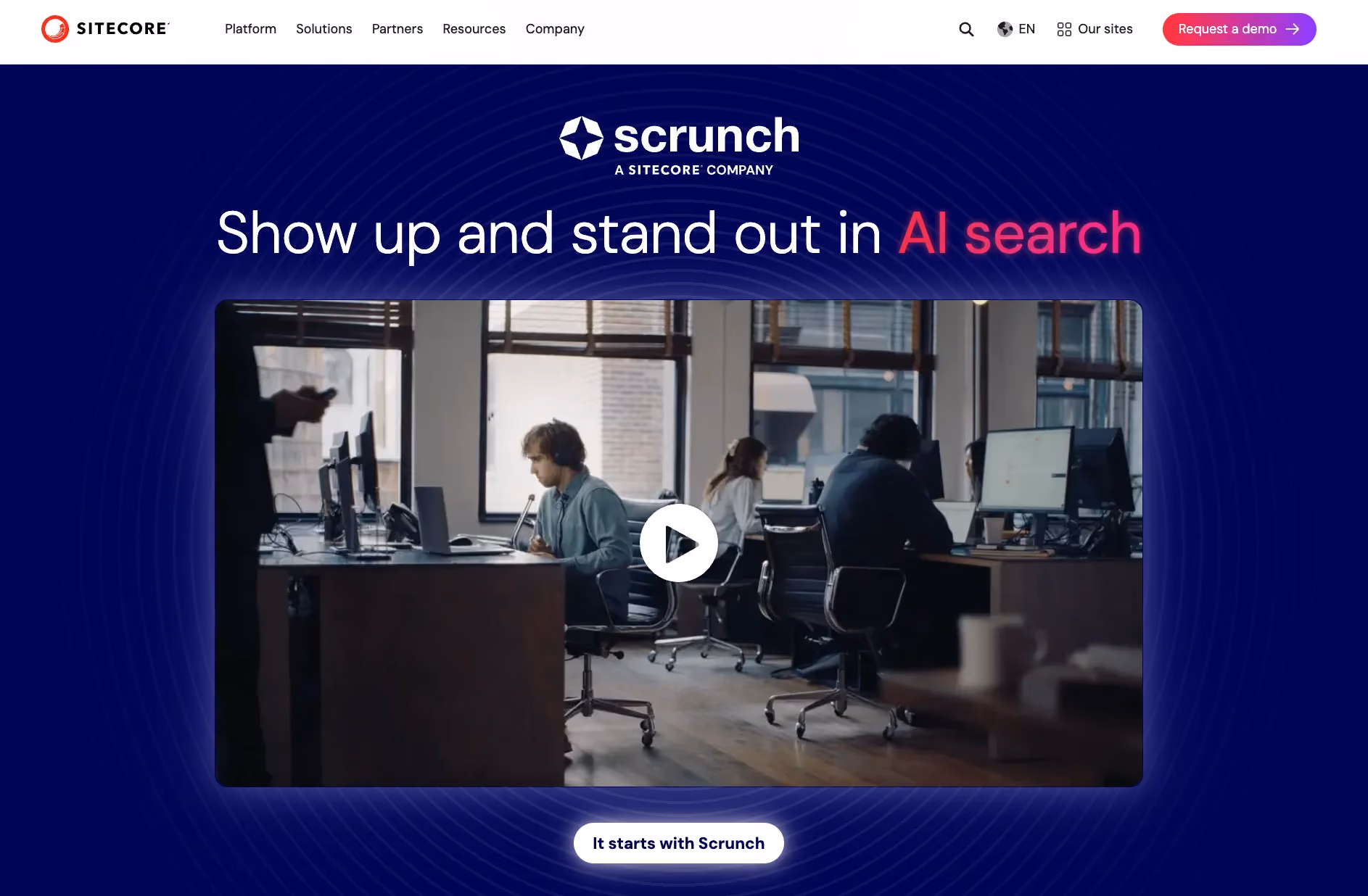 Sitecore's Scrunch product page with the headline "show up and stand out in AI search." Below sits a video thumbnail of an office scene with people working at desks, and a "it starts with Scrunch" button beneath the video.
