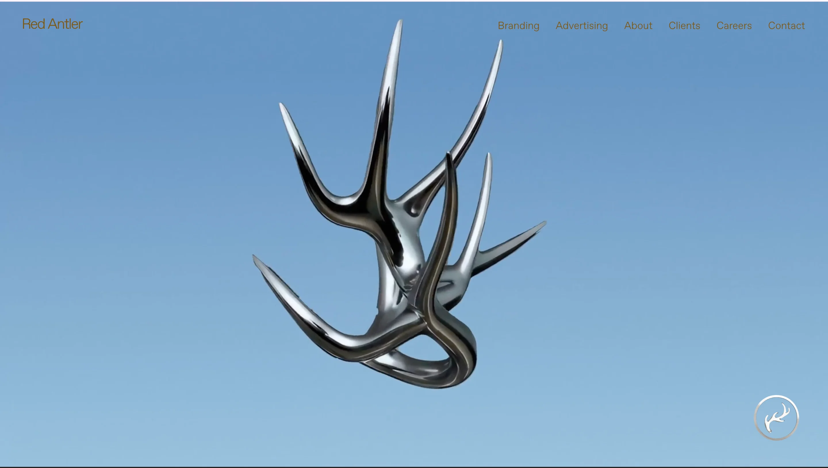 Red Antler's homepage showing a large chrome antler sculpture against a blue sky, with a navigation bar reading Branding, Advertising, About, Clients, Careers, Contact.