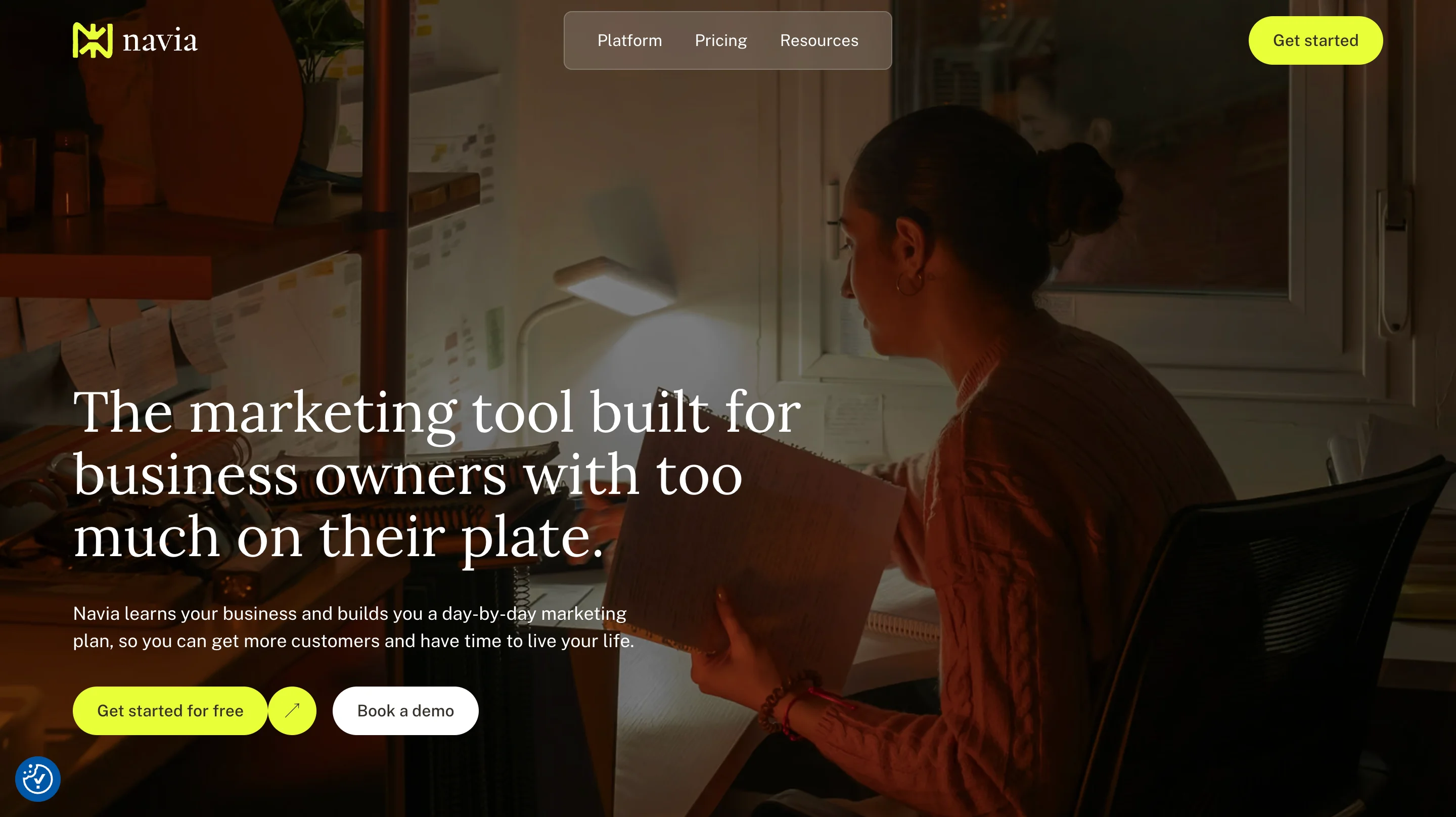 Navia hero section design with a full-bleed photo, a headline aimed at busy business owners, and two call-to-action buttons
