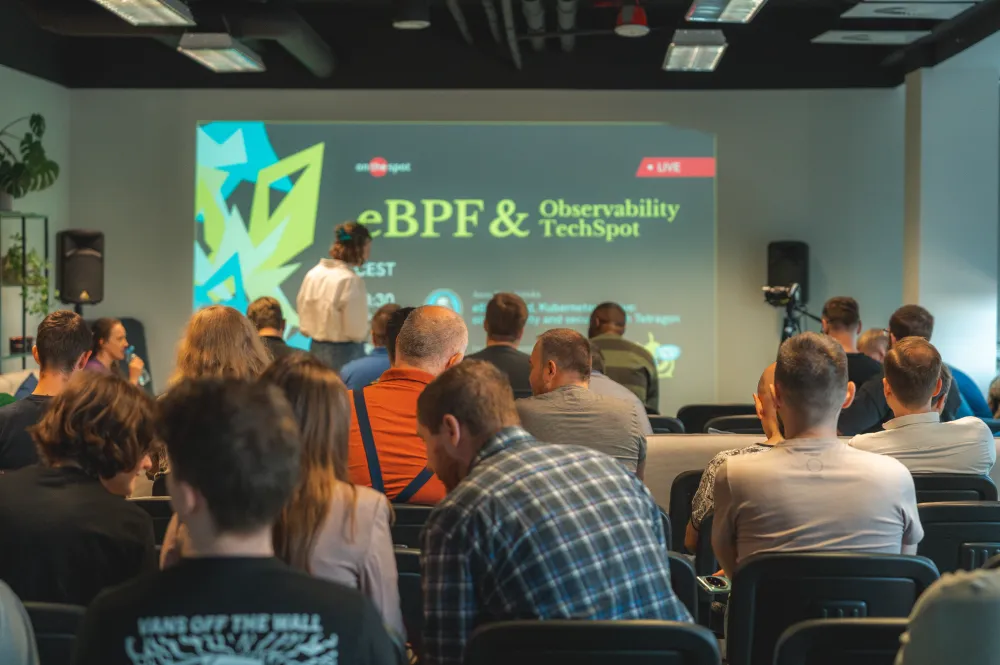 Audience in front of the eBPF & observability TechSpot title slide