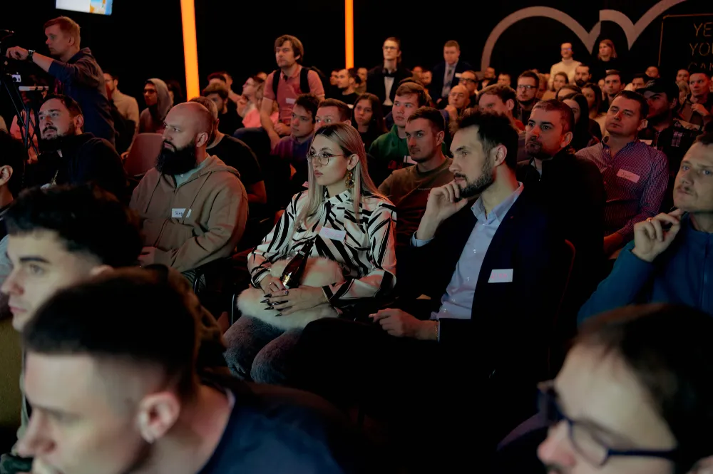 A full audience listening to a talk at Inside game architecture
