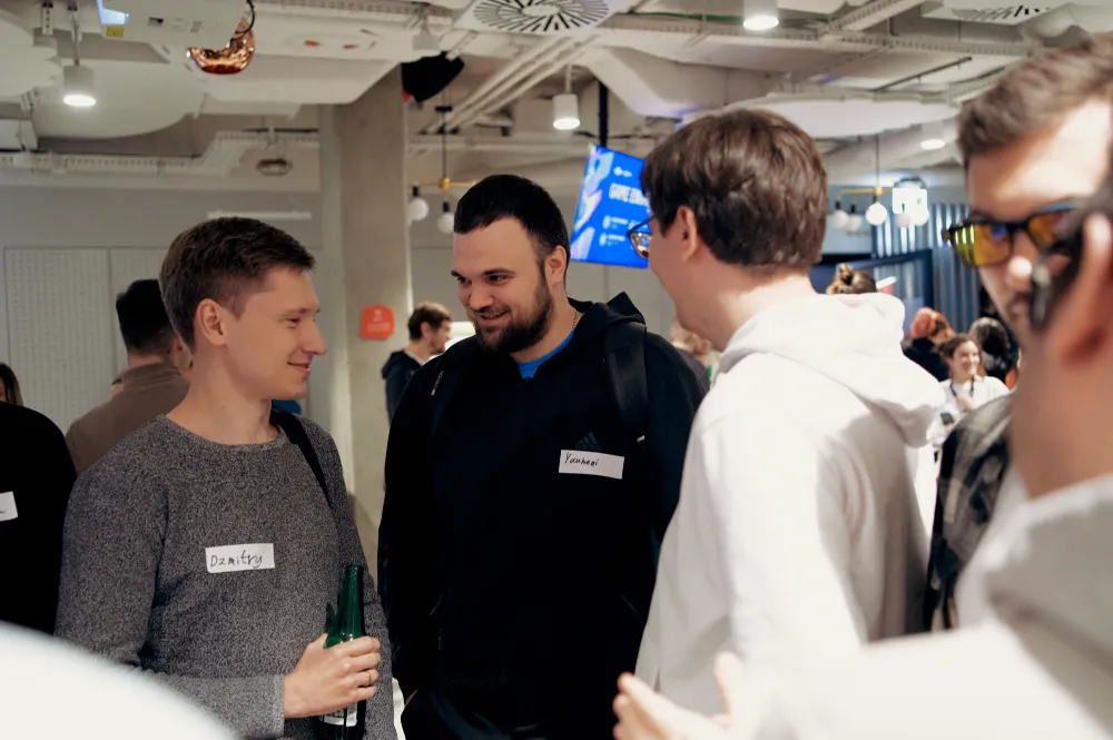 Guests with name badges talking during networking at Inside game architecture