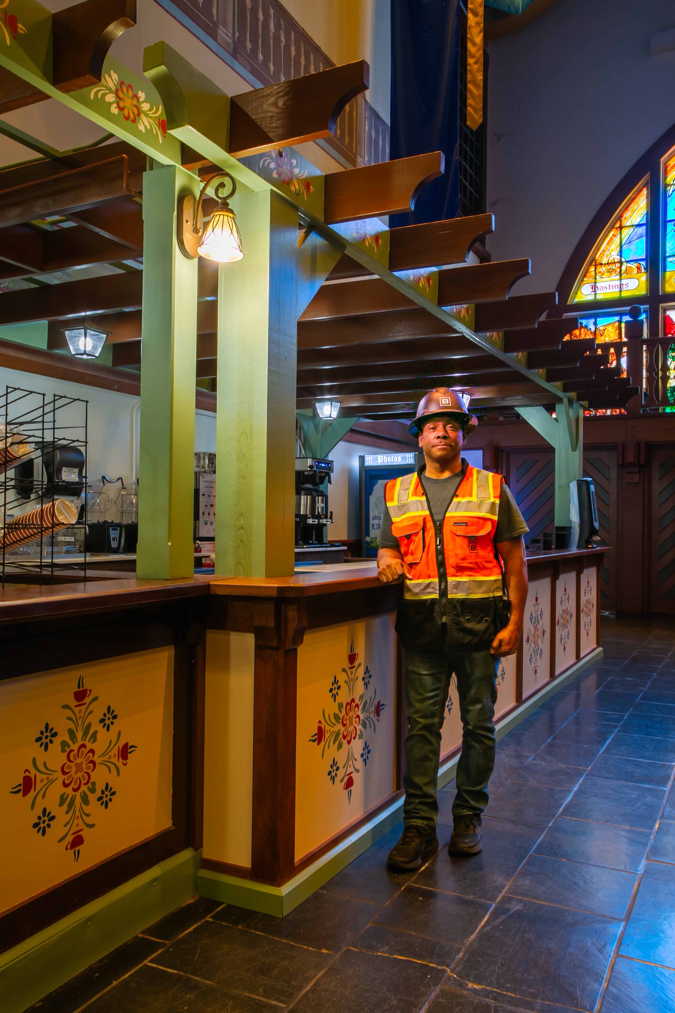 Malvin Tousant in front of the completed Busch Gardens' Festhaus Drink Bar