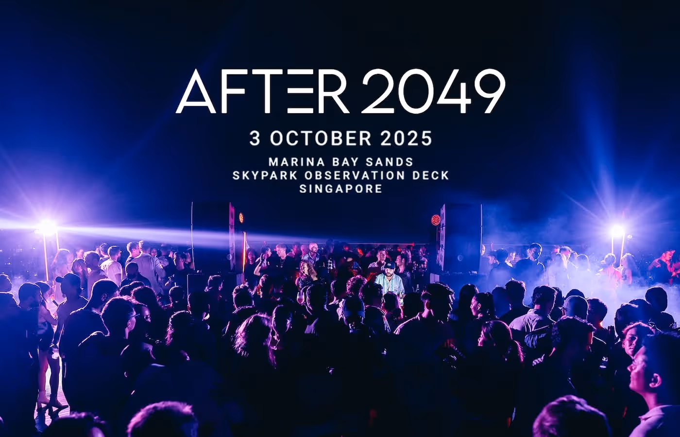 TOKEN2049 event in Singapore with laser lights and crowded dance floor