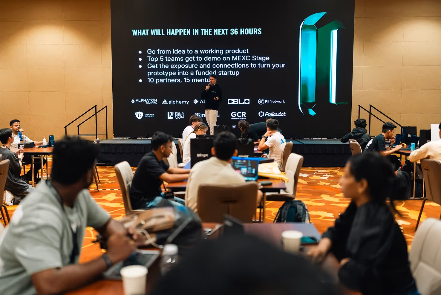 TOKEN2049 hackathon in Singapore with teams working on innovative tech projects