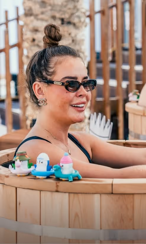 Attendees enjoying cold plunge tubs for recovery at TOKEN2049 Dubai