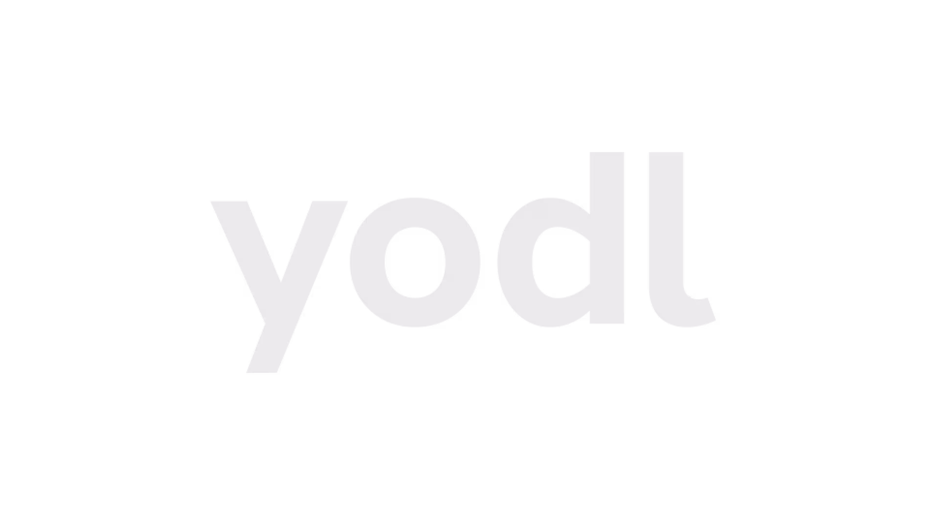 Yodl brand name in lowercase gray letters on black background.