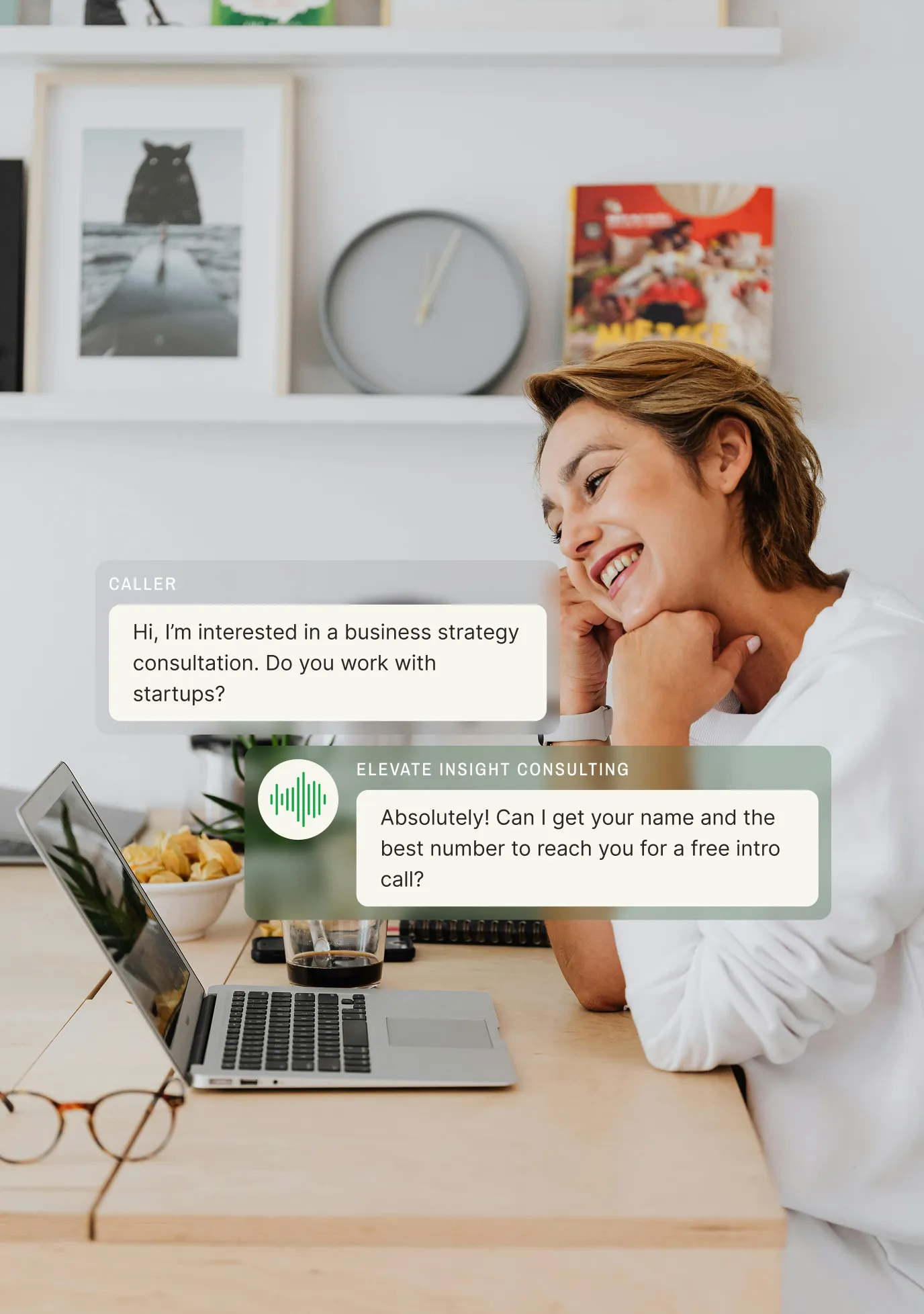 Business professional smiling at laptop while an answering service for consulting firms confirms a free intro call with a startup client.