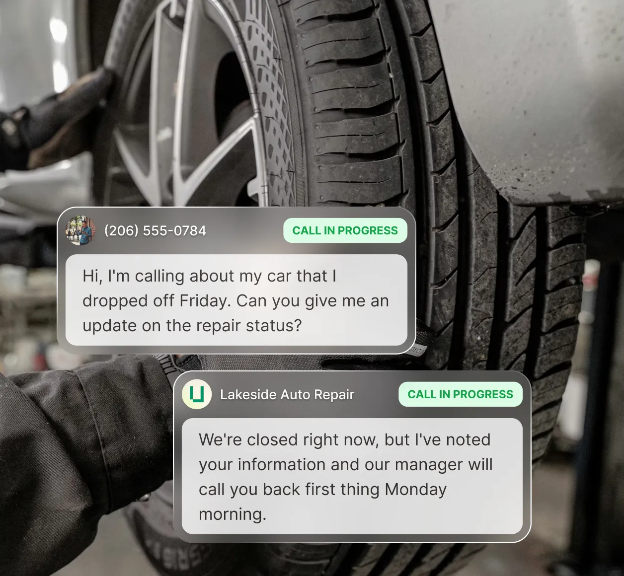Auto mechanic working on a tire as Upfirst's phone answering and scheduling service takes an after-hours repair status message.