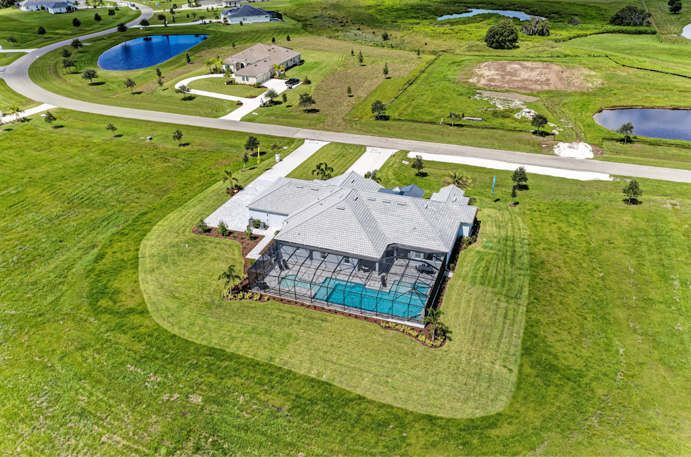 A Sarasota home listed by Medallion Home has an enclosed pool.