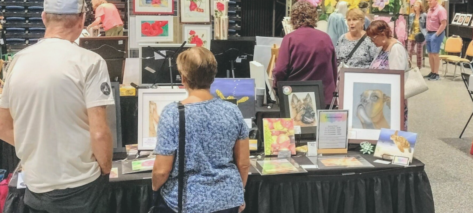 Symphony orchestra on stage, hands playing violin
