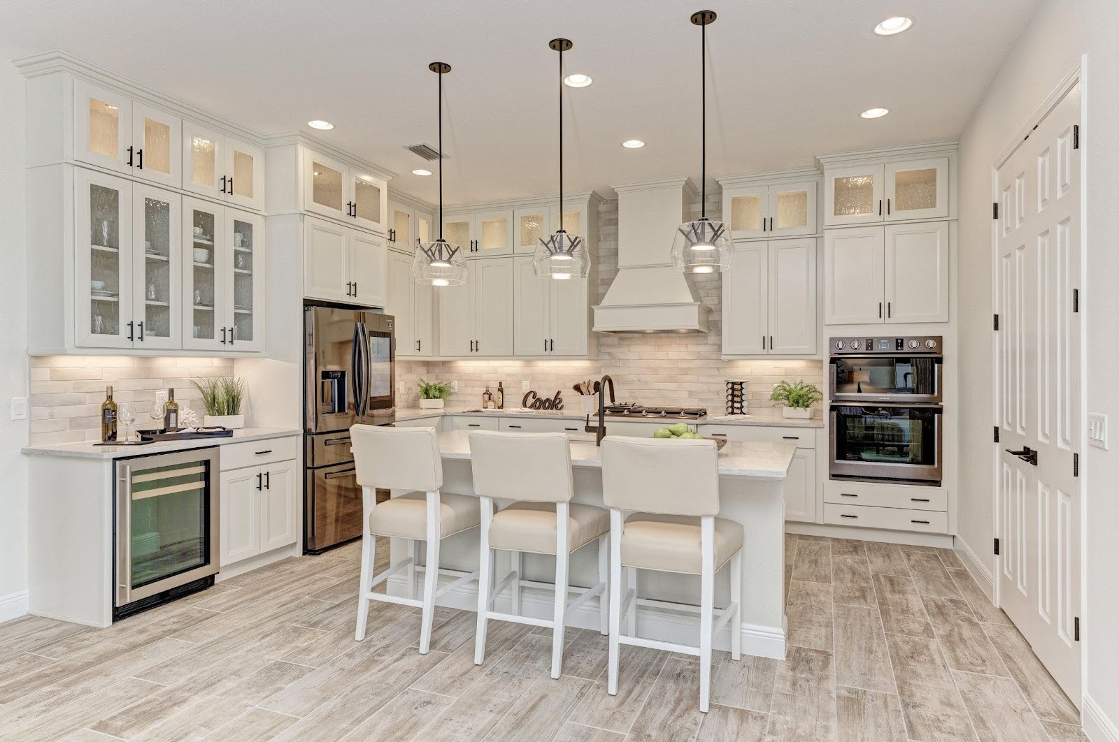 Kitchen interior of the Bermuda floorplan by Medallion Home at Watercolor Place