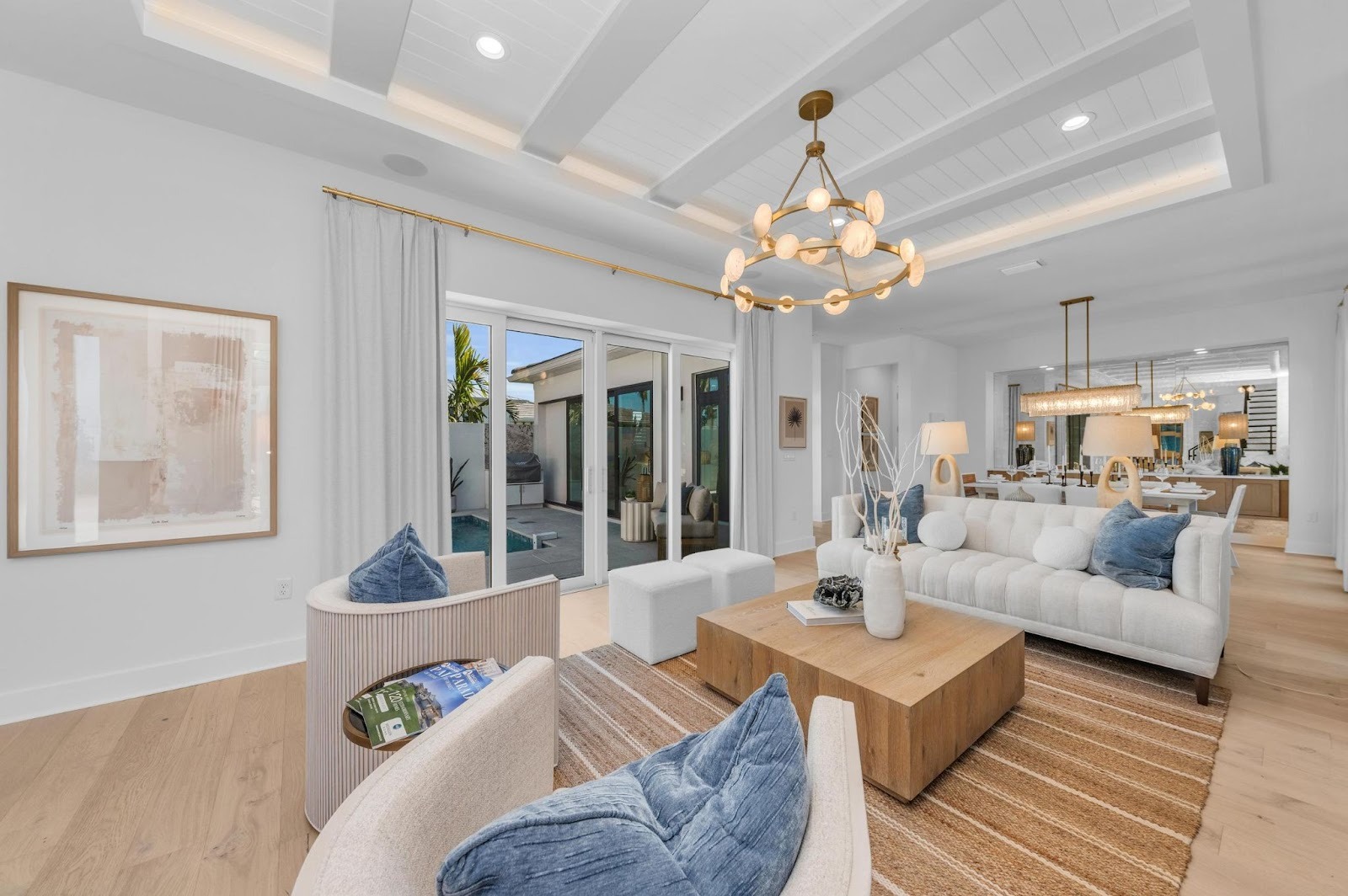 Living room and kitchen interior of the Silver Palm model home by Medallion Home
