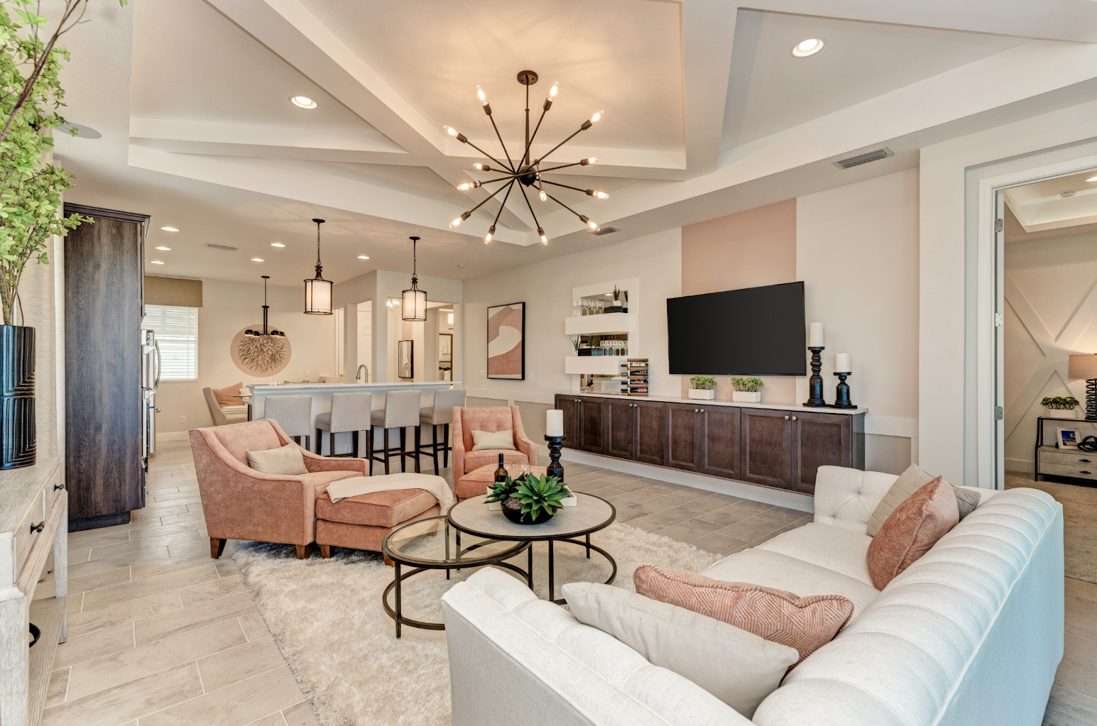 Medallion Home Sanibel villa floorplan, fully furnished living room and kitchen