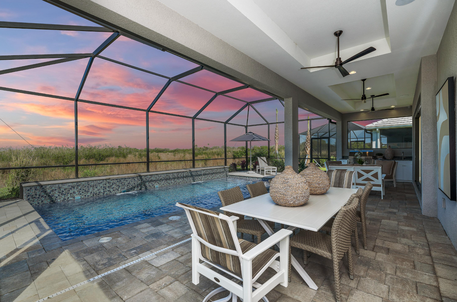 Lanai at sunset in the Bermuda floorplan by Medallion Home