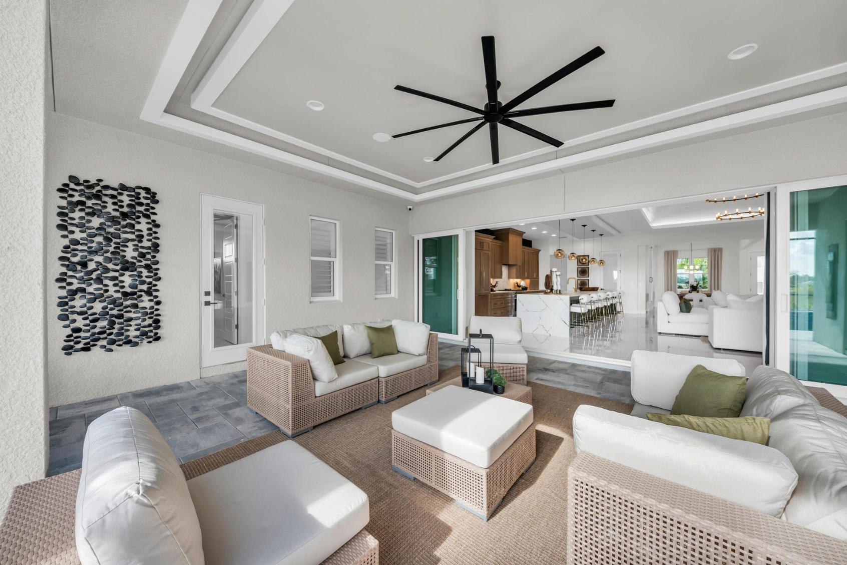 Medallion Home furnished model home indoor outdoor living space.