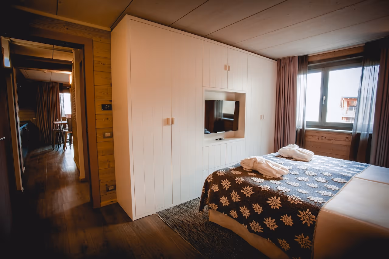 Suite matrimoniale-camera da letto-TV-DOS
