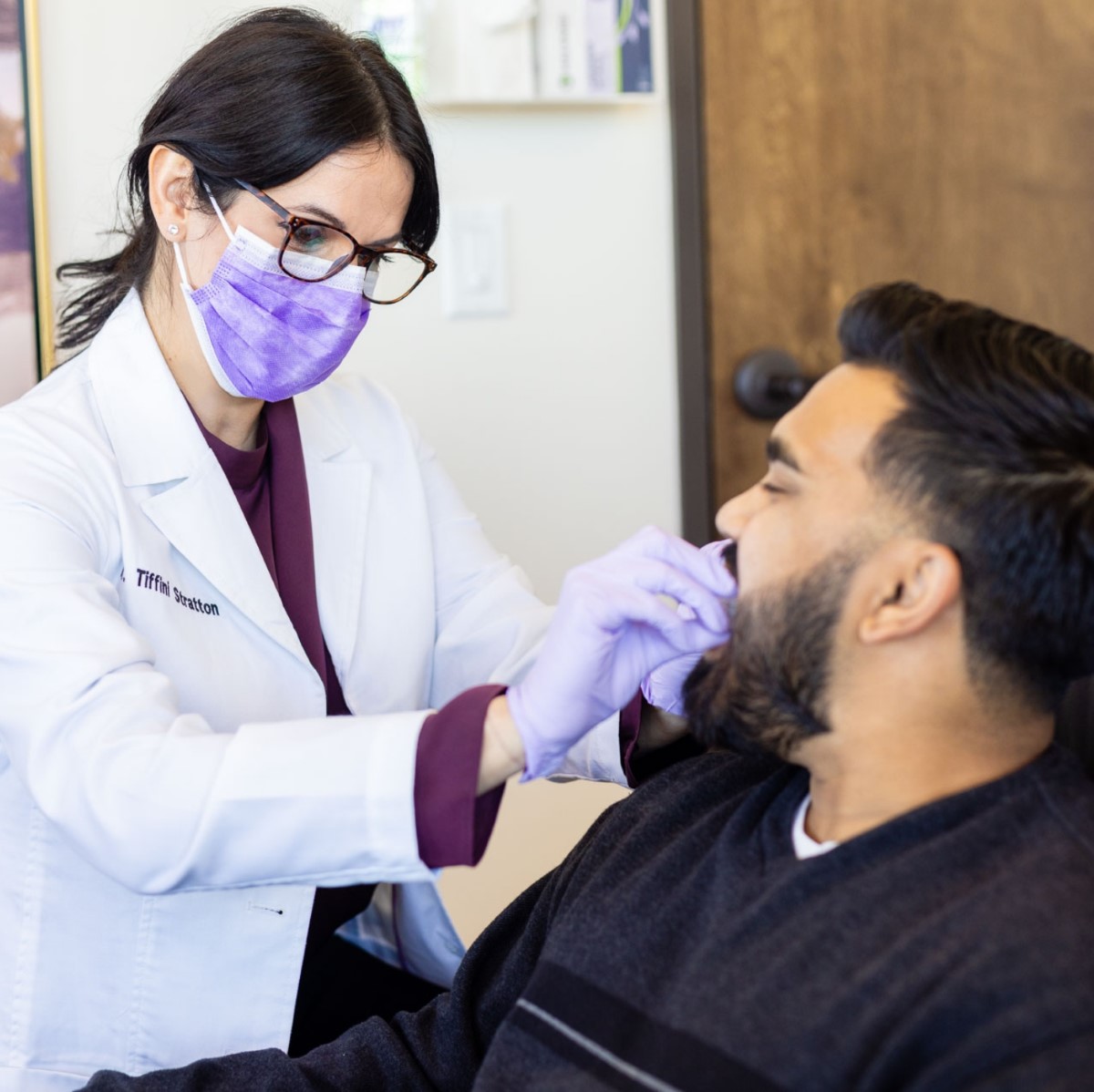 Doctor Tiffini Stratton treating a patient
