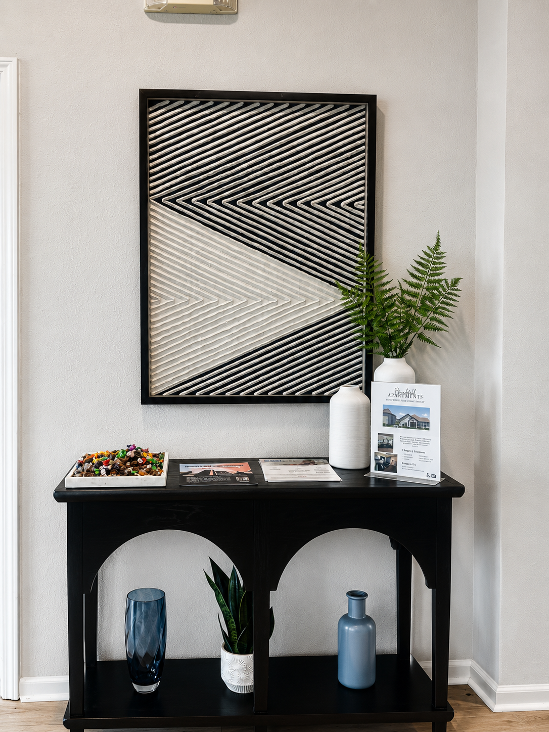 The office decorated table with wall art