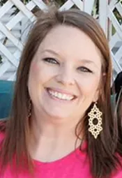 A headshot of Nichole Mesimer, the owner of Eastern Carolina Paw Co.