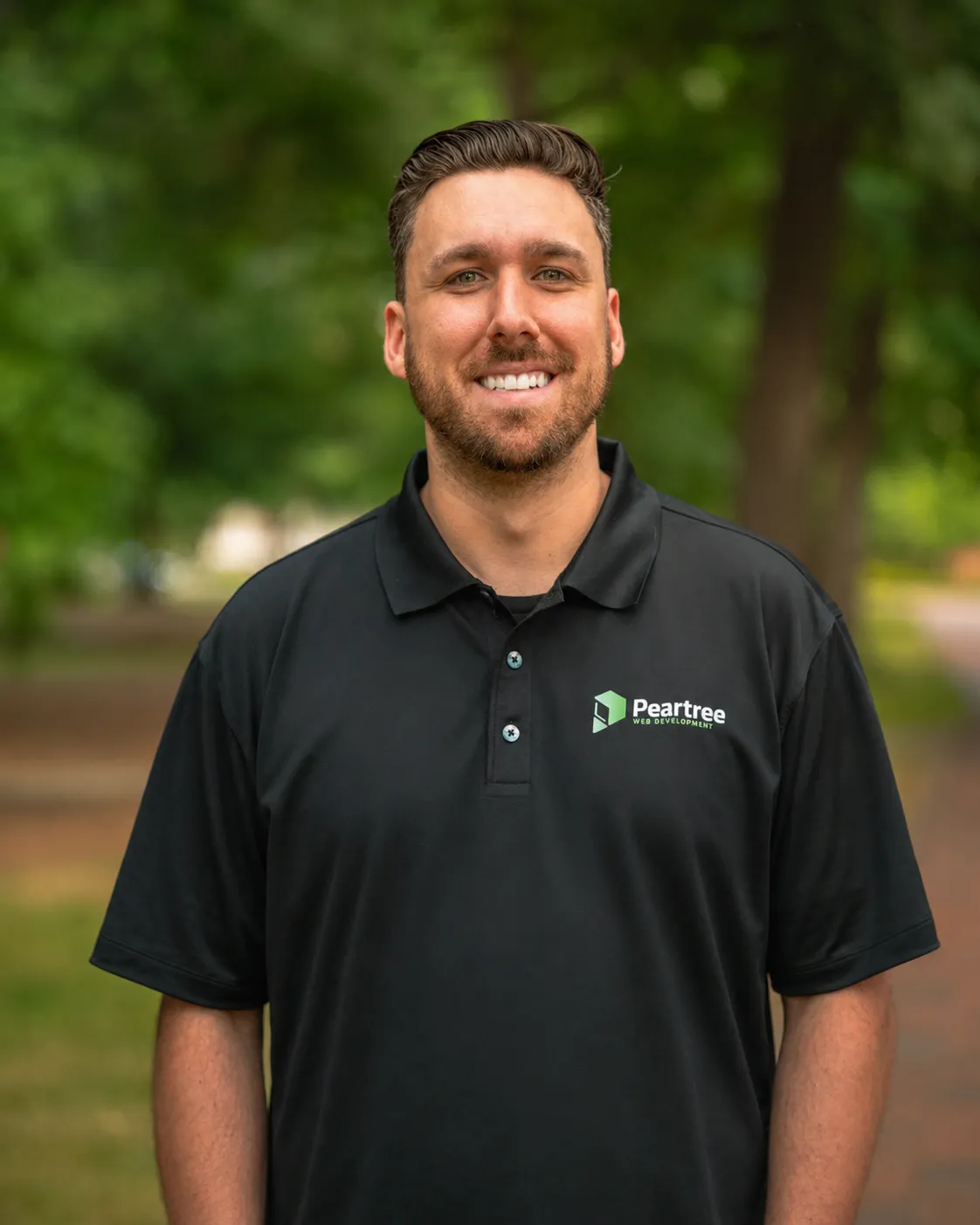 A headshot of Devin Trulin, one of the founders of Peartree Web Development
