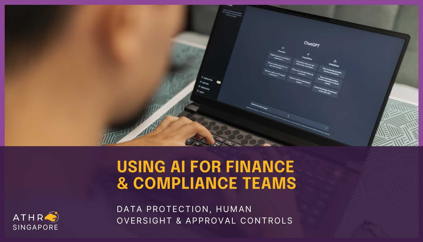 Singapore employee types on a laptop running AI software indoors.