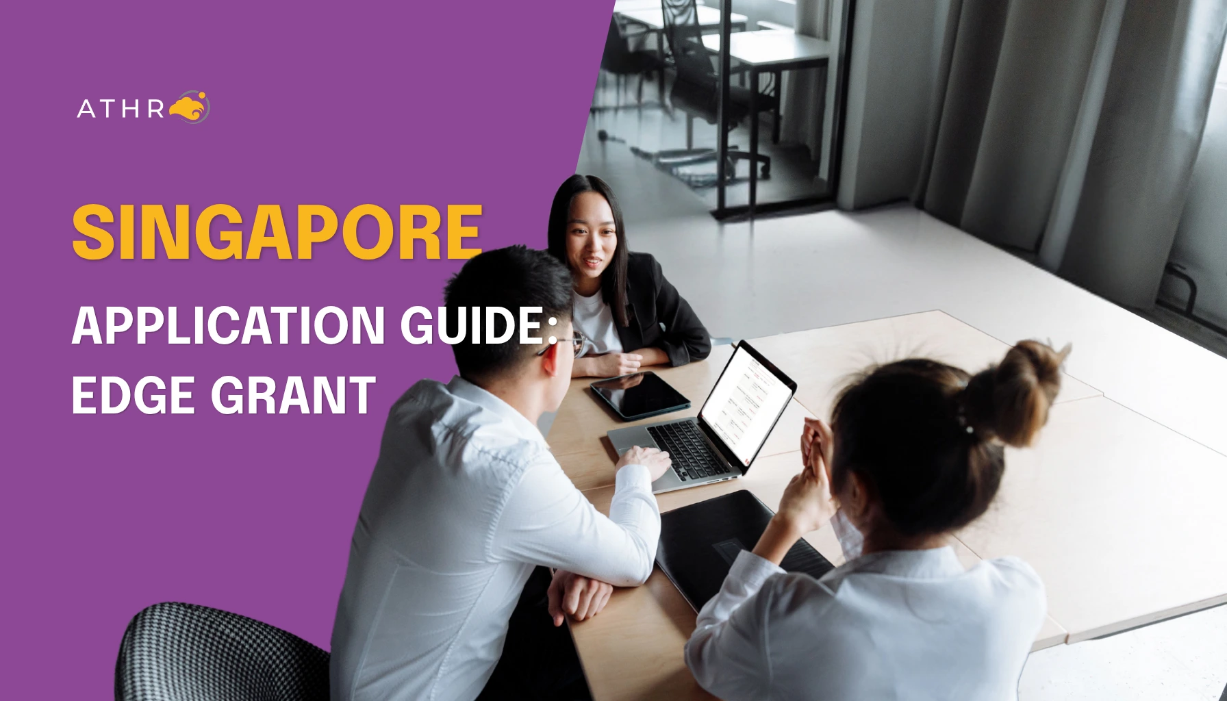 Startup team reviewing the EDGE Grant page for applicable funding options for digitalisation, business growth and overseas expansion.
